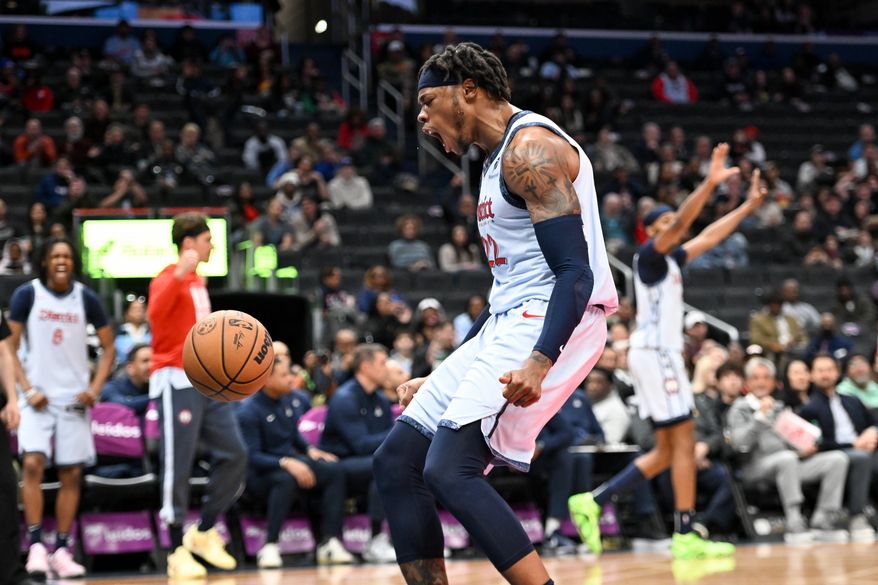 Washington Wizards center Richaun Holmes (22) after dunking the ball during the first quarter of an NBA game against the Brooklyn Nets at Capital One Arena in Washington D.C., February 24, 2025. (Photo for the Washington Times)
