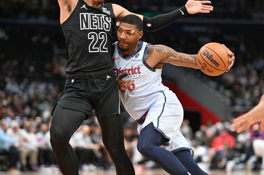 Washington Wizards guard Marcus Smart (36) driving to the basket during the first quarter of an NBA game against the Brooklyn Nets at Capital One Arena in Washington D.C., February 24, 2025. (Photo for the Washington Times)