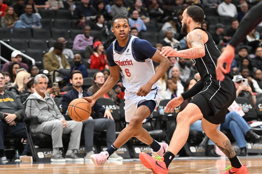 Washington Wizards guard Carlton Carrington (8) dribbling the ball during the first quarter of an NBA game against the Brooklyn Nets at Capital One Arena in Washington D.C., February 24, 2025. (Photo for the Washington Times)