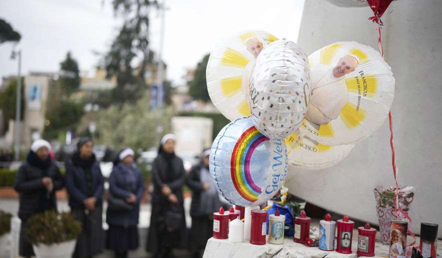 Nuns pray at the Agostino Gemelli Polyclinic, in Rome, Monday, Feb. 24, 2025 where Pope Francis is hospitalized since Friday, Feb. 14. (AP Photo/Alessandra Tarantino)