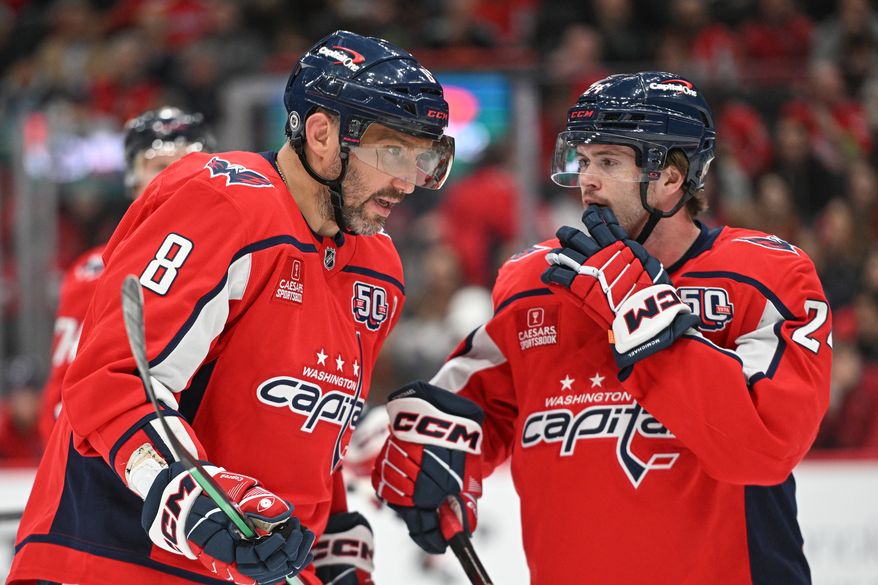 Washington Capitals left wing Alex Ovechkin (8) talking it over with Connor McMichael (24) during the second period of an NHL game against the St. Louis Blues at Capital One Arena in Washington D.C., February 27, 2025. (Photo for the Washington Times)