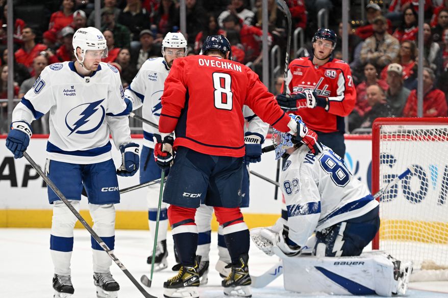 Washington Capitals left wing Alex Ovechkin (8) putting his hand on Tampa Bay Lightning goalie Andrei Vasilevskiy (88) during the third period of an NHL game at Capital One Arena in Washington D.C., March 1, 2025. (Photo for the Washington Times)
