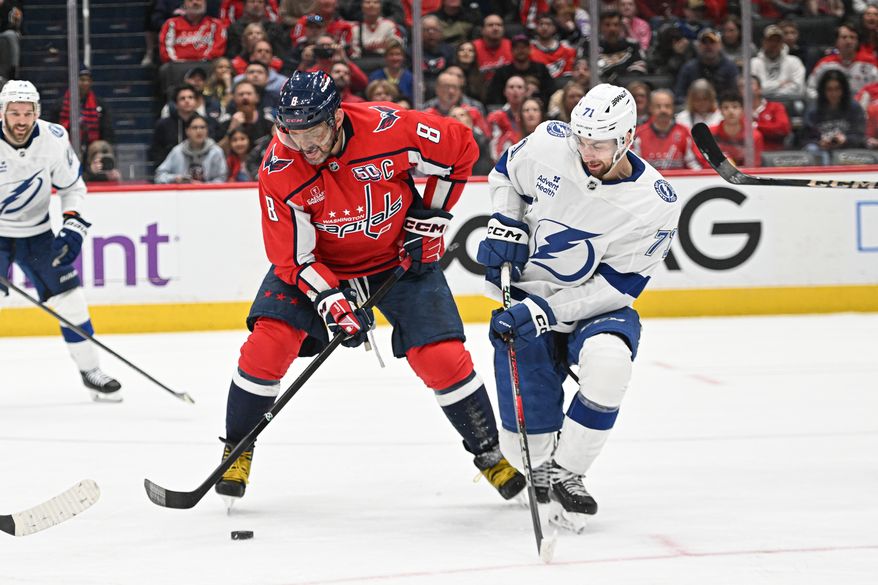 Washington Capitals left wing Alex Ovechkin (8) gaining control of the puck before his goal during the third period of an NHL game against the Tampa Bay Lightning at Capital One Arena in Washington D.C., March 1, 2025. (Photo for the Washington Times)