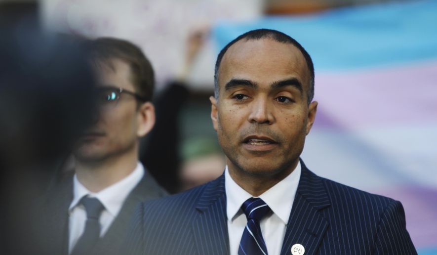 Washington Attorney General Nick Brown speaks during a news conference after a hearing in federal court in Seattle, on Friday, Feb. 28, 2025, over President Donald Trump's order against gender-affirming care for youth. (AP Photo/Manuel Valdes)