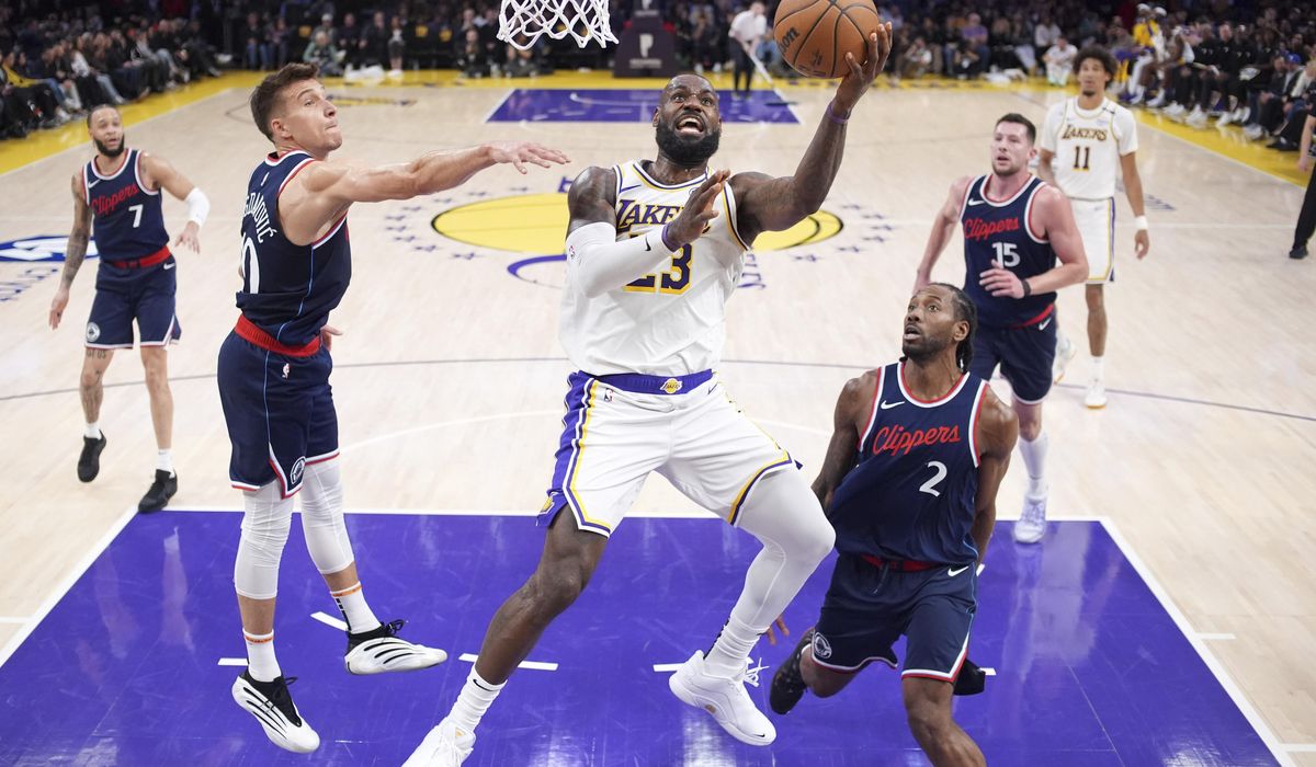 NextImg:James becomes first to score 50,000 combined points in NBA regular season, playoffs