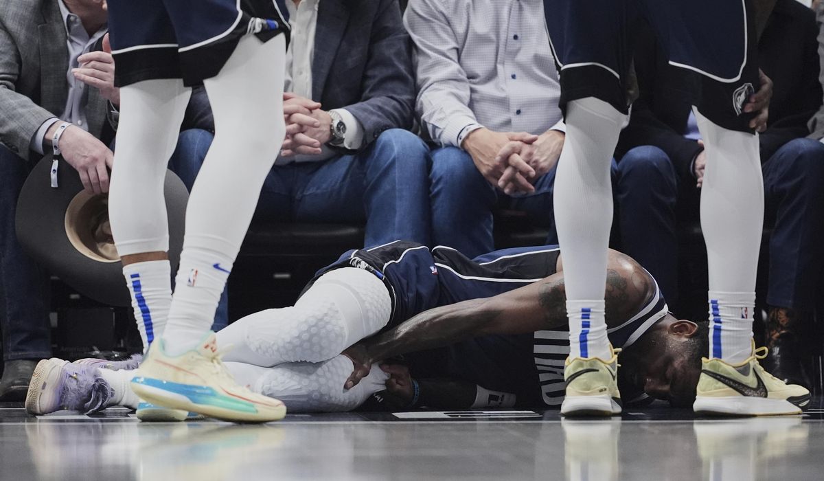 NextImg:Mavericks star Kyrie Irving out for the season with torn ACL