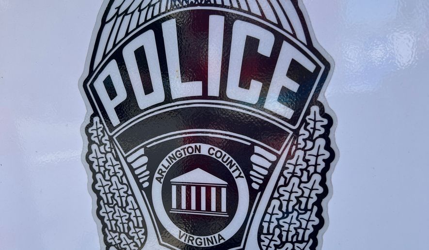 Arlington County Police badge decal on portable speed limit sign. File photo credit: DCStockPhotography via Shutterstock.