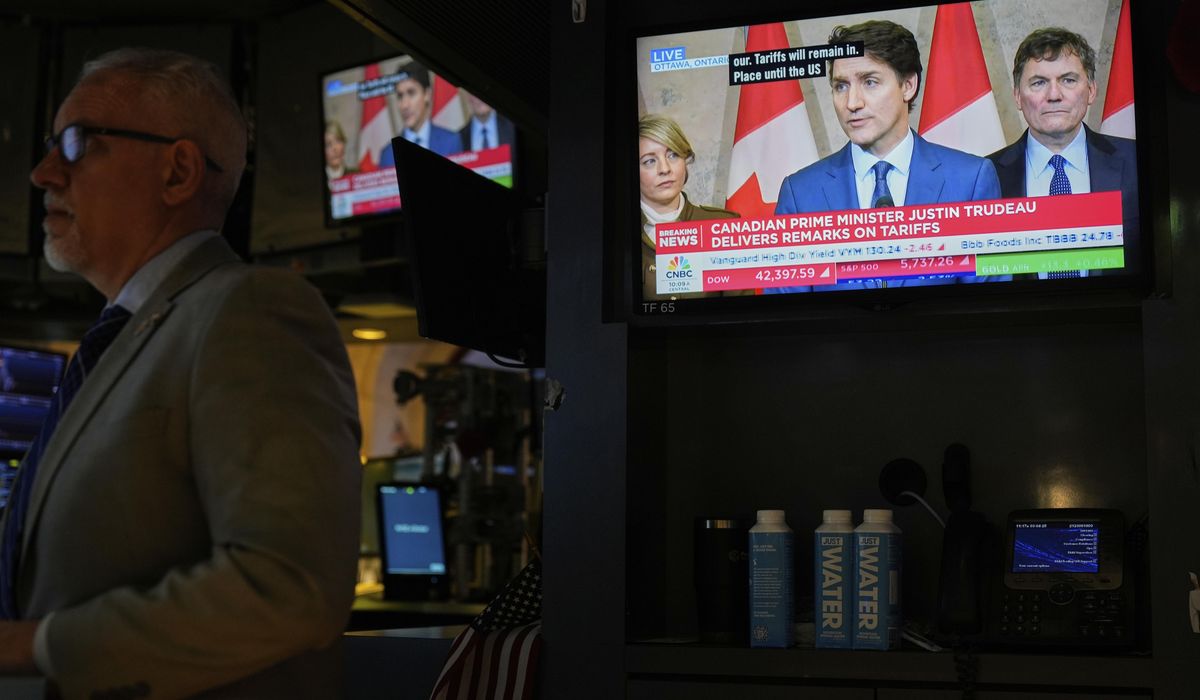 NextImg:Trudeau slams Trump for starting a trade war with Canada while appeasing Putin