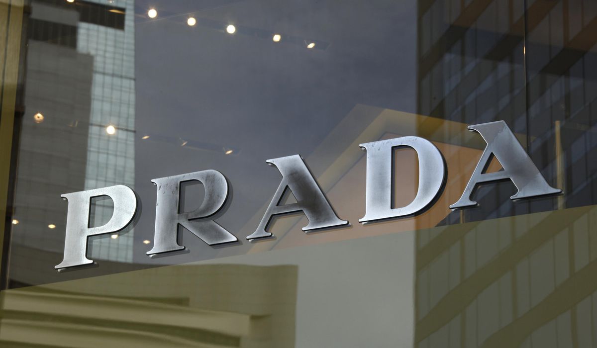 NextImg:Prada posts double-digit growth in 2024 as it eyes Versace acquisition