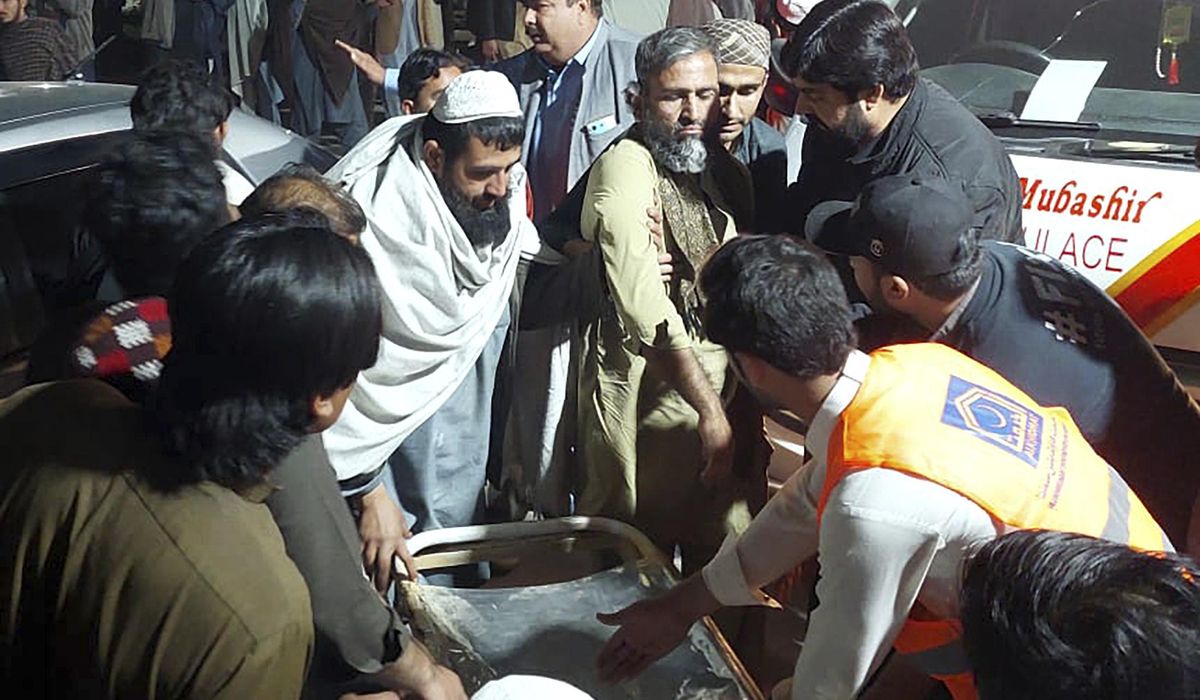 NextImg:Two suicide bombings at a military base in Pakistan kill at least 9 people and injure 25