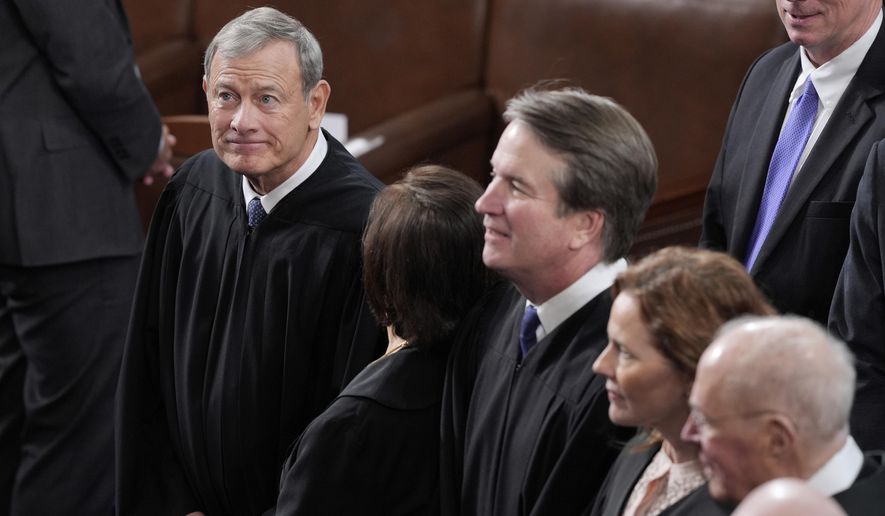 Supreme Court Chief Justice John Roberts, left, and associate justices, arrive in the House Chamber before President Donald Trump arrives to address a joint session of Congress at the Capitol in Washington, Tuesday, March 4, 2025. (AP Photo/J. Scott Applewhite) **FILE**