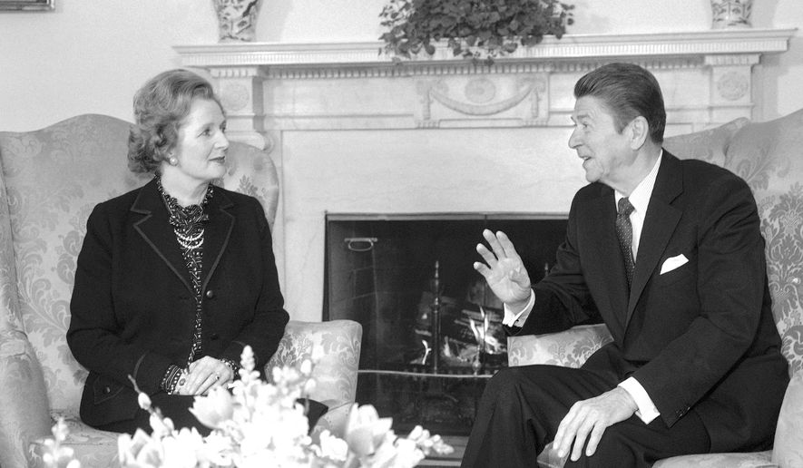 British Prime Minister Margaret Thatcher meets with President Ronald Reagan in the Oval Office of the White House on Thursday, Feb. 26, 1981 in Washington. (AP Photo)