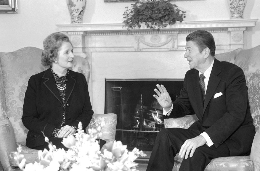 British Prime Minister Margaret Thatcher meets with President Ronald Reagan in the Oval Office of the White House on Thursday, Feb. 26, 1981 in Washington. (AP Photo)