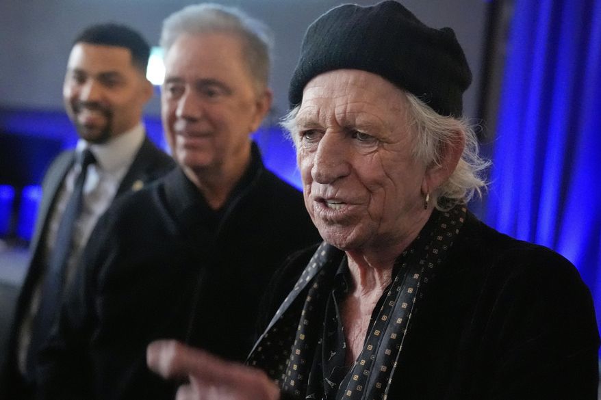 Keith Richards greets people before receiving the first Connecticut Governor's Award of Excellence in Westport, Conn., Wednesday, March 5, 2025. (AP Photo/Seth Wenig)