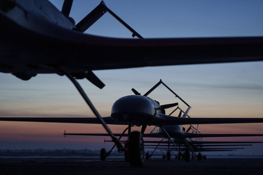 Long-range drones An-196 Liutyi of the Defence Intelligence of Ukraine stand in line before takeoff in undisclosed location, Ukraine, Feb. 28, 2025. (AP Photo/Evgeniy Maloletka) **FILE**