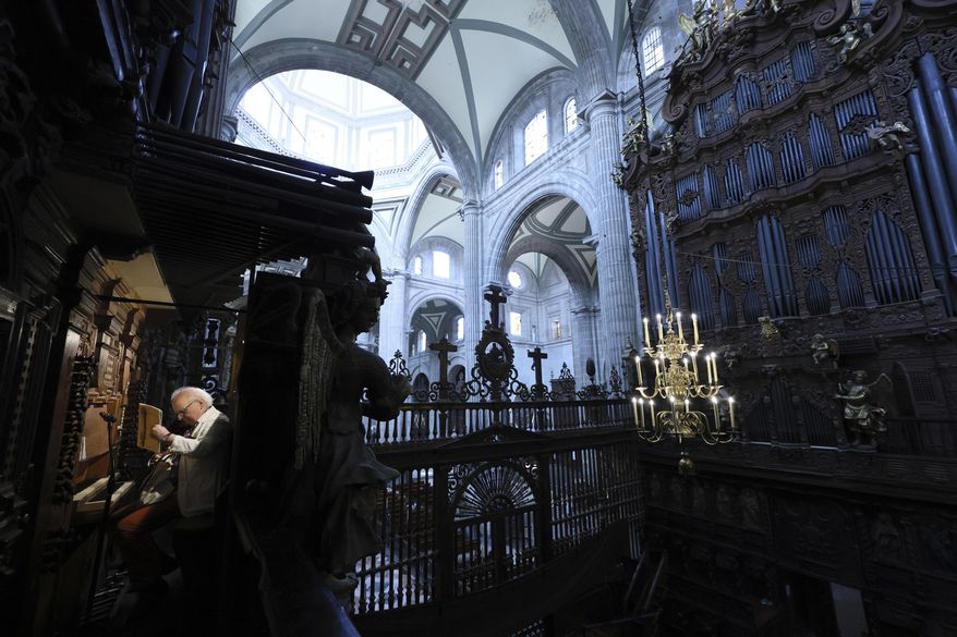 German director and organist Leo Krämer rehearses for a concert at the Metropolitan Cathedral in Mexico City, Friday, Feb. 28, 2025. (AP Photo/Ginnette Riquelme)