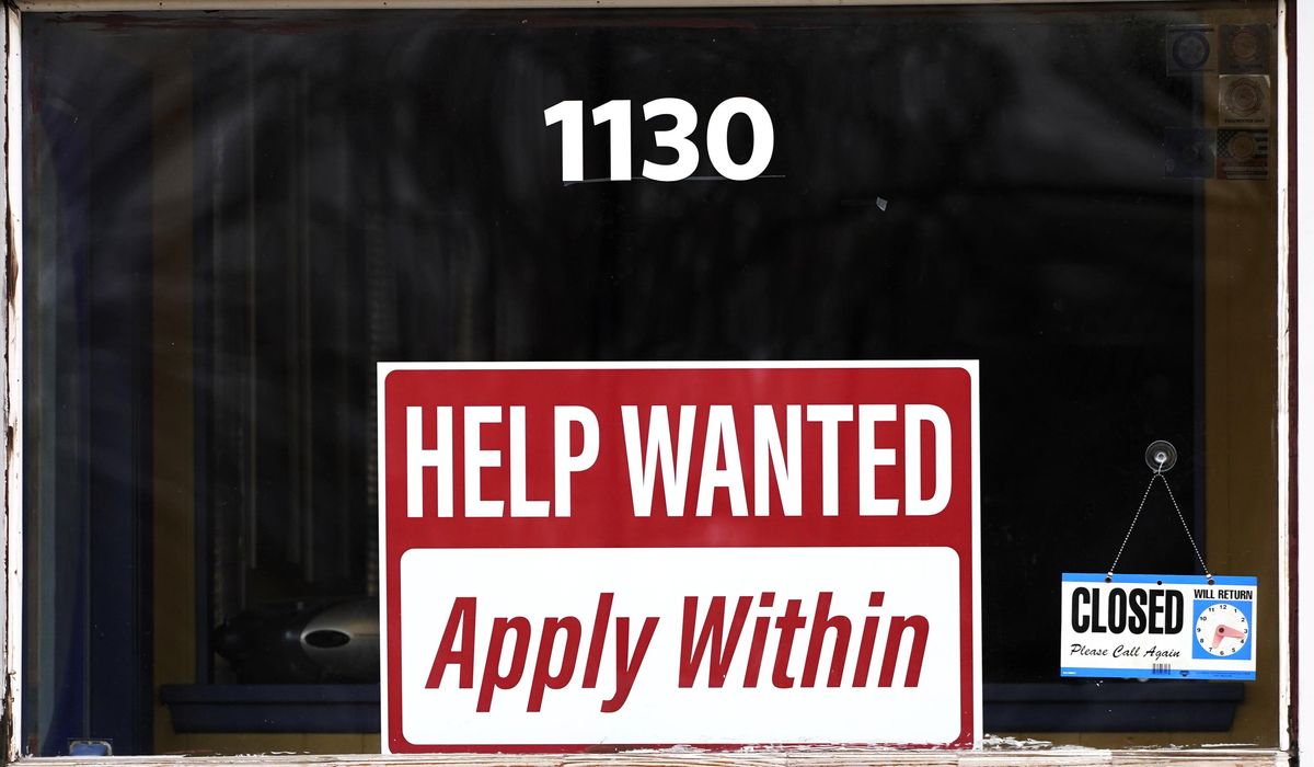 NextImg:The number of Americans filing for jobless benefits falls as labor market remains sturdy