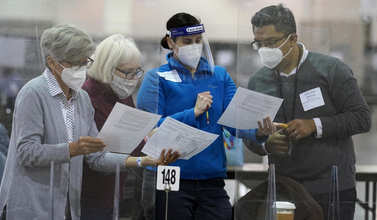 NextImg:Wisconsin voters whose ballots were not counted in November election seek damages