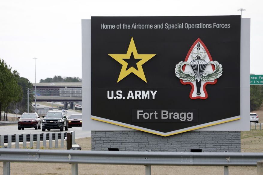 A sign at the main gate reflects the name change as Fort Liberty was rededicated as Fort Bragg during a ceremony on base, Friday, March 7, 2025, (AP Photo/Chris Seward) ** FILE **