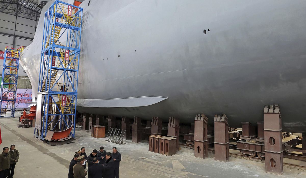 NextImg:North Korea unveils nuclear-powered submarine for the first time