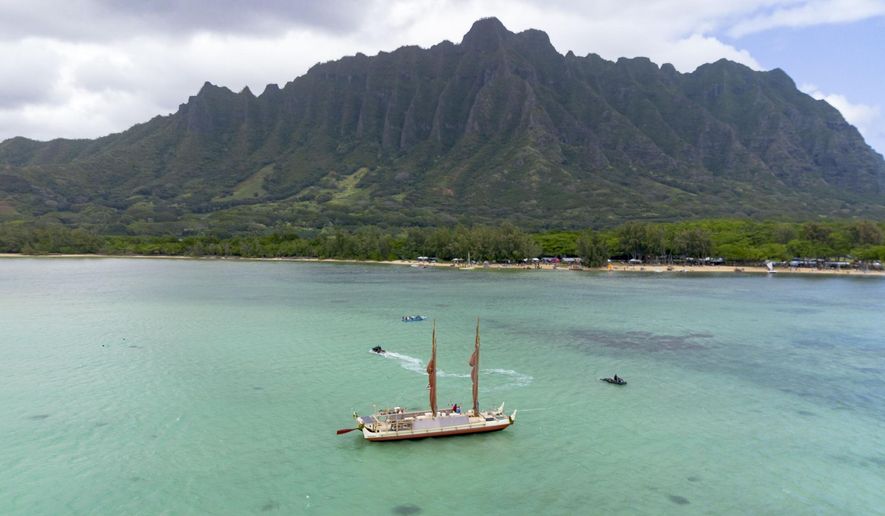 Hokulea is pictured at the shore of Kualoa Regional Park after its 50th birthday commemoration, Saturday, March 8, 2025, in Kaneohe, Hawaii. (AP Photo/Mengshin Lin)