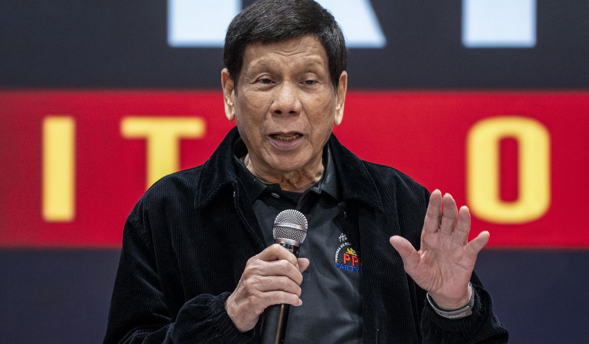 NextImg:Philippine ex-President Duterte brushes off possible arrest by ICC on a trip to Hong Kong
