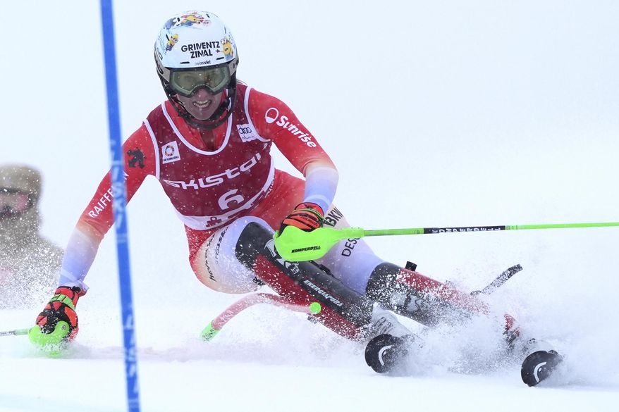 Switzerland's Camille Rast speeds down the course during an alpine ski, women's World Cup slalom in Are, Sweden, Sunday, March 9, 2025. (AP Photo/Giovanni Auletta)