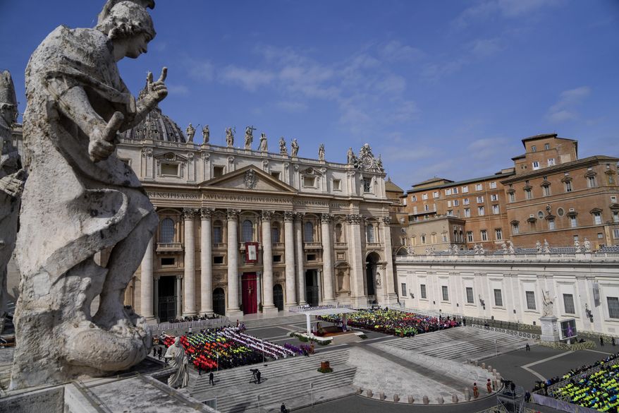 Cardinal Michael Czerny, prefect of the Dicastery for Promoting Integral Human Development, and delegate of Pope Francis celebrates a mass for the members of the world of volunteers in St. Peter's Square at The Vatican, Sunday, March 9, 2025. (AP Photo/Gregorio Borgia)