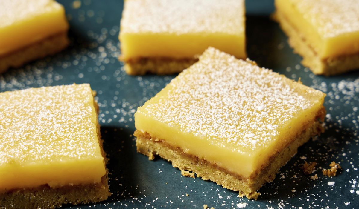 NextImg:Savory olive oil and buttery pistachios bring sophisticated flavors to tangy-sweet lemon bars
