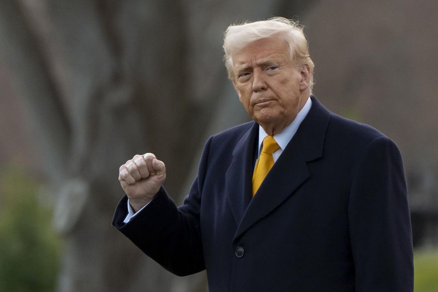 President Donald Trump pumps his fist before departing on Marine One from the South Lawn of the White House, Friday, March 7, 2025, in Washington. (AP Photo/Alex Brandon) **FILE**