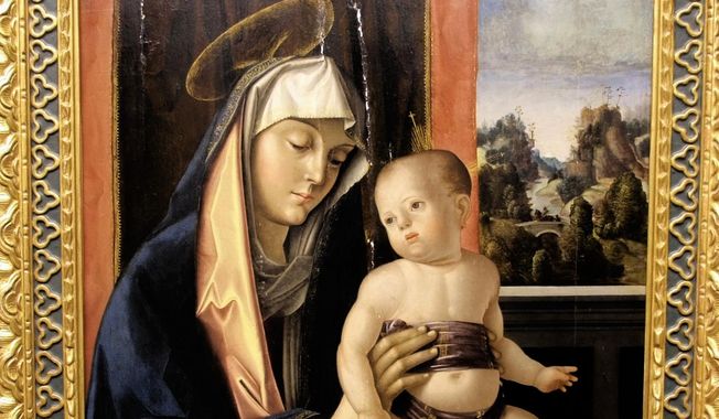 The 16th-century painting "Madonna and Child" by Italian painter Antonio Solari that was stolen more than 50 years ago and it is now at the center of a custody battle between a widow in England and a small Italian museum. (Art Recovery International via AP)