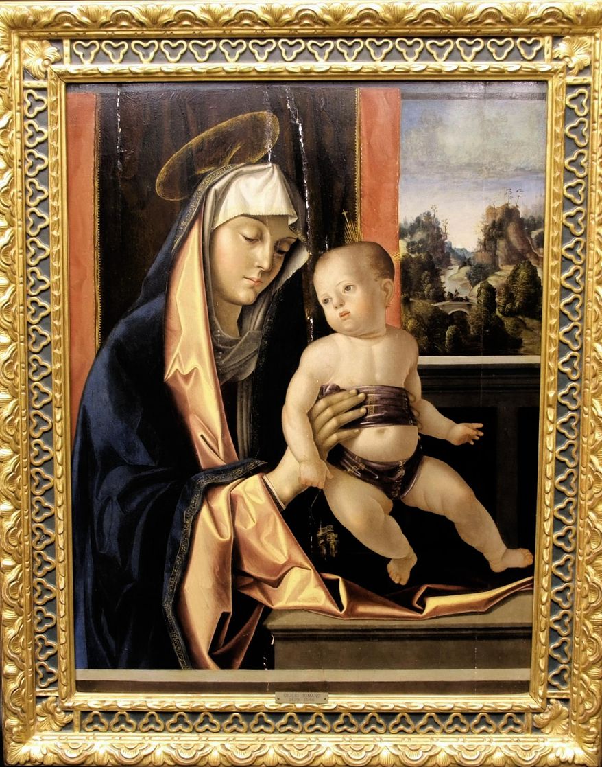 The 16th-century painting "Madonna and Child" by Italian painter Antonio Solari that was stolen more than 50 years ago and it is now at the center of a custody battle between a widow in England and a small Italian museum. (Art Recovery International via AP)