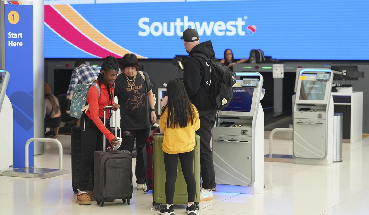 NextImg:At Southwest Airlines, checked bags will no longer fly for free