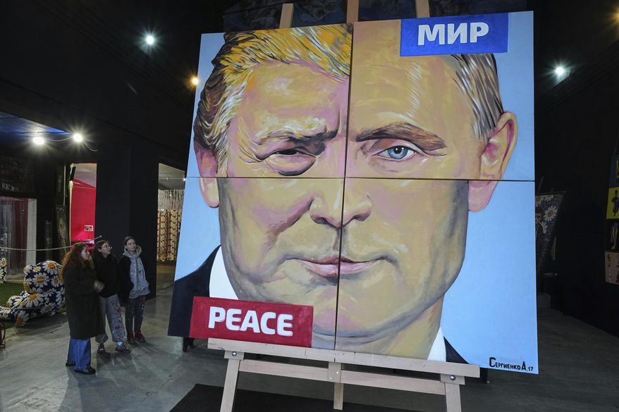"Peace to the world," a painting created by Russian artist Alexei Sergienko showing a combination of faces of Russian President Vladimir Putin and U.S. President Donald Trump, is on display at the Sergienko's gallery in St. Petersburg, Russia, Friday, March 14, 2025. (AP Photo/Dmitri Lovetsky)