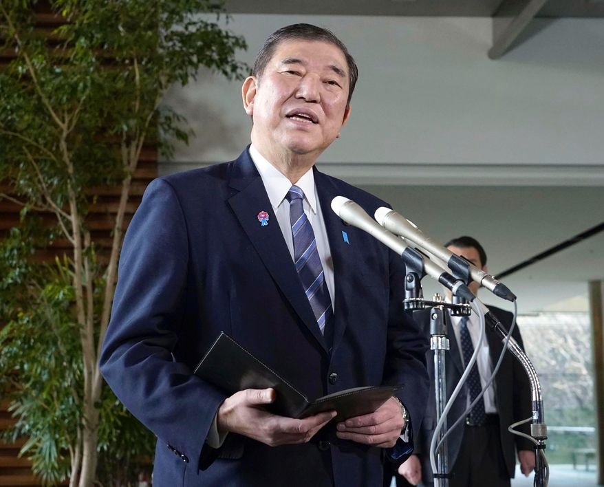 Japan's Prime Minister Shigeru Ishiba speaks to the media at the prime minister's office in Tokyo, Japan, Friday, March 14, 2025.(Kyodo News via AP)