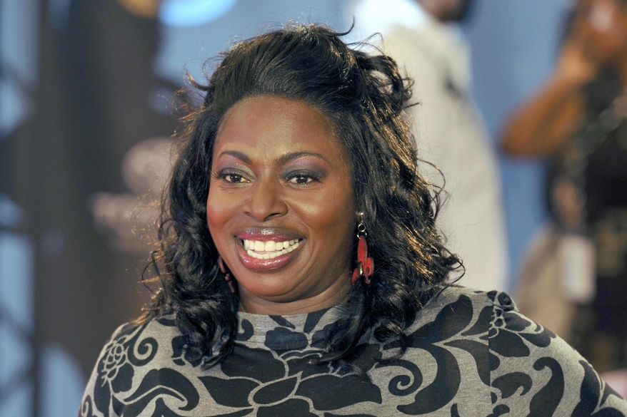 Angie Stone poses as she walks down the red carpet during the 2009 Soul Train Awards taping at the Georgia World Congress Center, Tuesday, Nov. 3, 2009 in Atlanta. (AP Photo/Gregory Smith, File)
