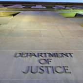 The Department of Justice headquarters building in Washington is photographed early in the morning, May 14, 2013. (AP Photo/J. David Ake, File)