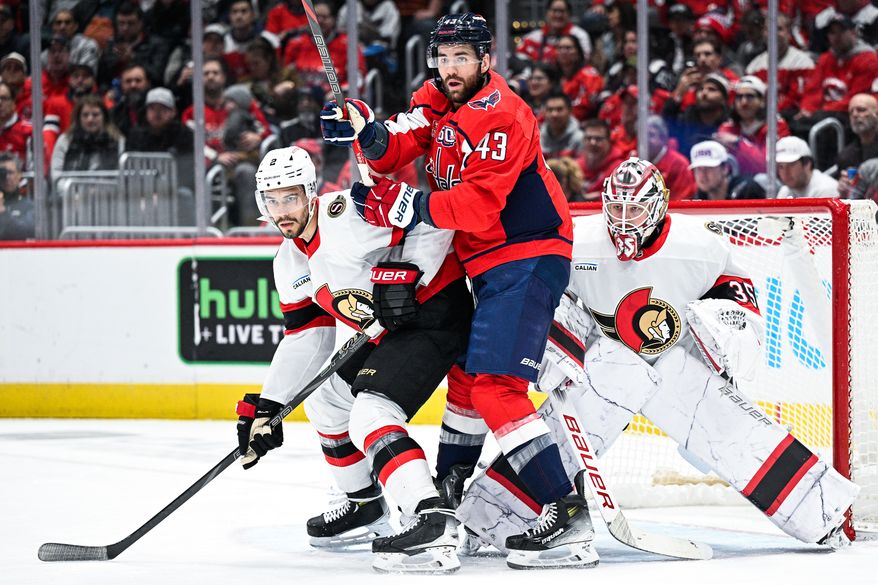 Washington Capitals right wing Tom Wilson (43) sets a screen in front of Ottawa Senators goalie Linus Ullmark (35) at Capital One Arena, Washington, D.C., March 3, 2025. (Photo by Brian Murphy for the Washington Times)
