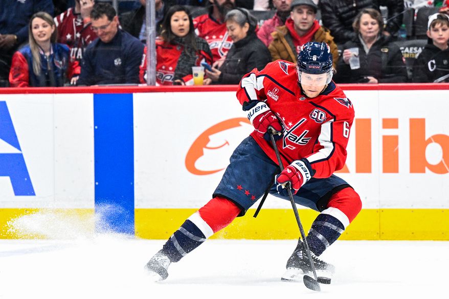 Washington Capitals defenseman Jakob Chychrun (6) hustles to keep the puck in the offensive zone against the Ottawa Senators at Capital One Arena, Washington, D.C., March 3, 2025. (Photo by Brian Murphy for the Washington Times)
