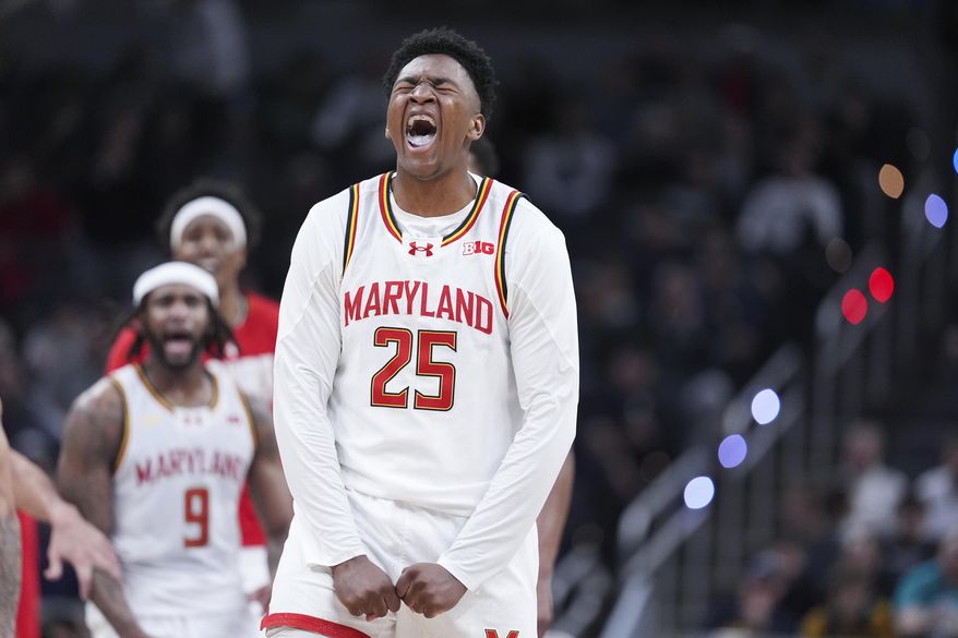 Maryland center Derik Queen (25) reacts to a basket against the Michigan during the second half of an NCAA college basketball game in the semifinals of the Big Ten Conference tournament in Indianapolis, Saturday, March 15, 2025. (AP Photo/Michael Conroy)