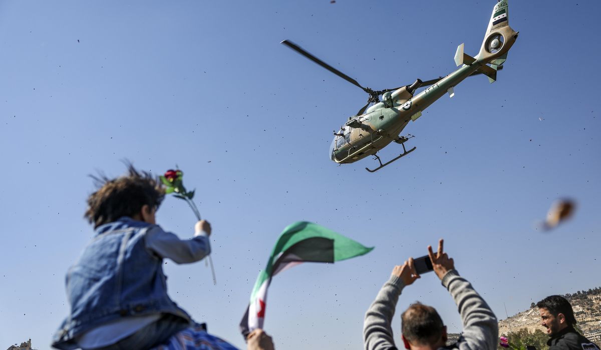 NextImg:Syrians mark 14th anniversary of civil war uprising by celebrating the ouster of Bashar Assad