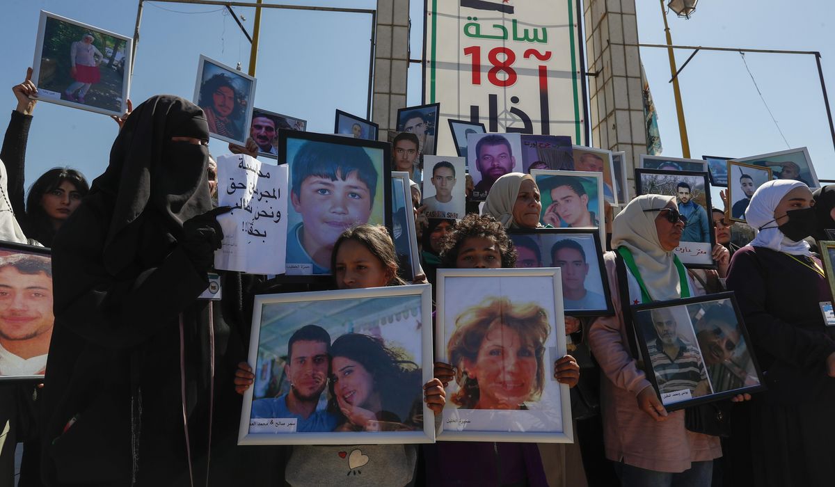 NextImg:Families of Syrians who disappeared during its civil war say the search must go on
