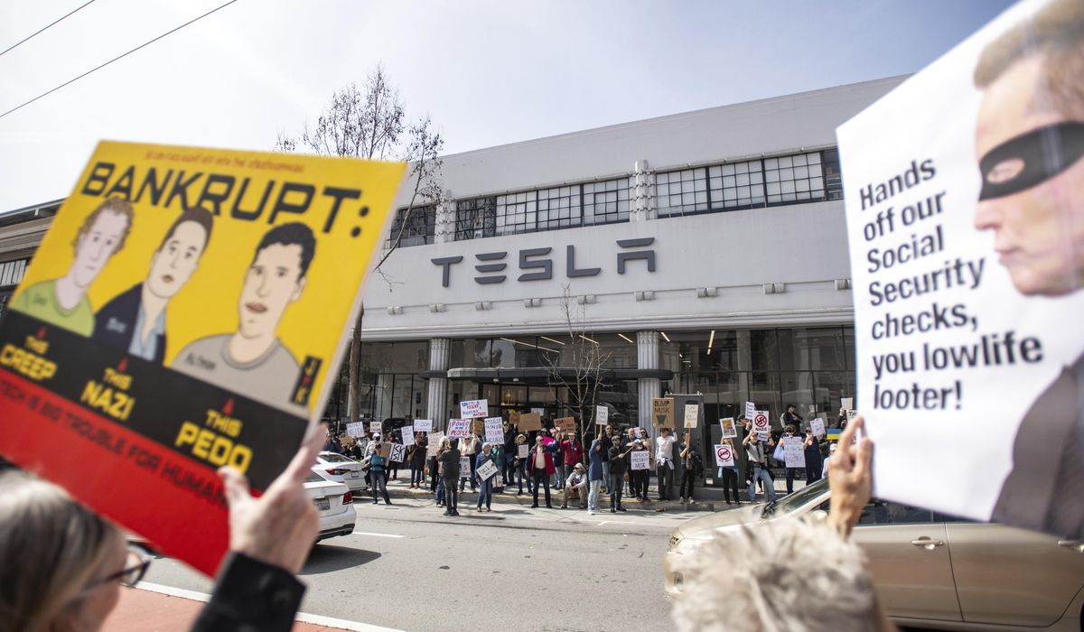 NextImg:FBI opens terrorism probe after arson attacks at Tesla dealers in Las Vegas, Kansas City