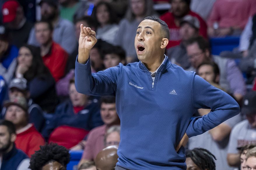 South Alabama head coach Richie Riley talks with players during the first half of an NCAA college basketball game against Alabama, Tuesday, Nov. 15, 2022, in Mobile, Ala. (AP Photo/Vasha Hunt) **FILE**