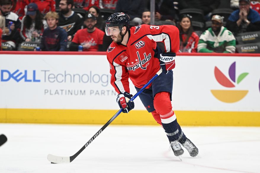 Washington Capitals defenseman Matt Roy (3) skating up ice with the puck during the first period of an NHL game against the Detroit Red Wings at Capital One Arena in Washington D.C., March 18, 2025. (Photo for the Washington Times)