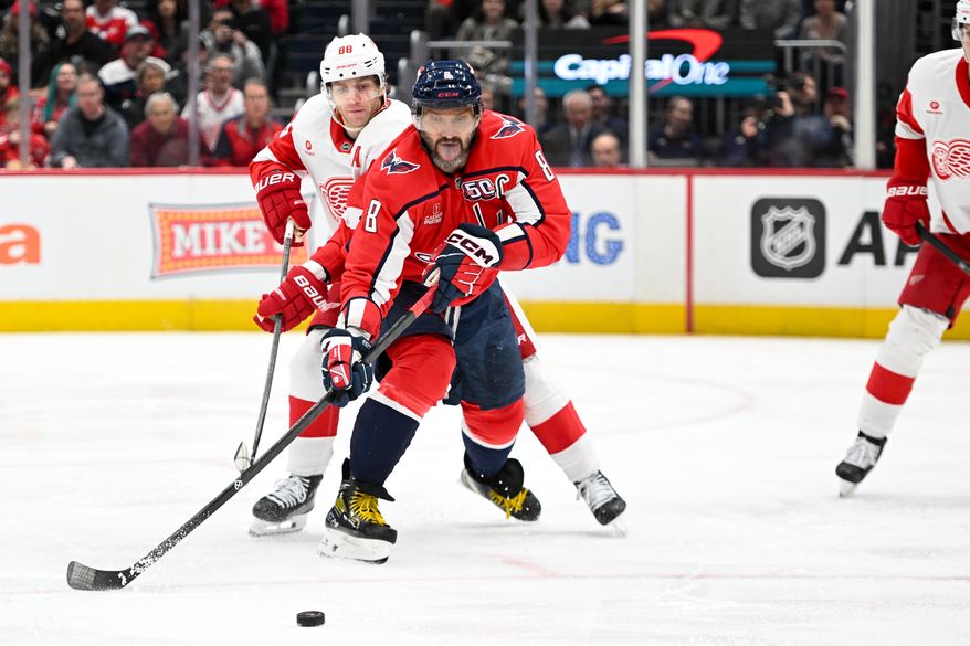 Washington Capitals left wing Alex Ovechkin (8) reaching for the puck during the second period of an NHL game against the Detroit Red Wings at Capital One Arena in Washington D.C., March 18, 2025. (Photo for the Washington Times)