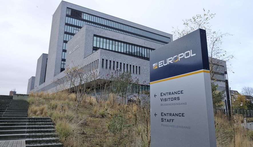The exterior view of the European police agency Europol headquarters in The Hague, Netherlands, Friday, Dec. 2, 2016. (AP Photo/Mike Corder, File)