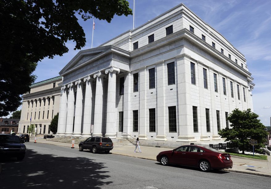 FILE - Exterior view of the New York Court of Appeals building on Wednesday, June 1, 2016, in Albany, N.Y. (AP Photo/Hans Pennink, File)