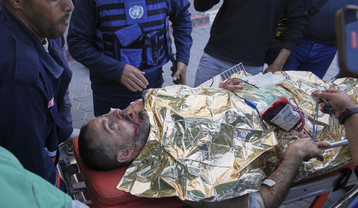 NextImg:U.N. to reduce staff in Gaza and blames Israel for a strike that killed its employee