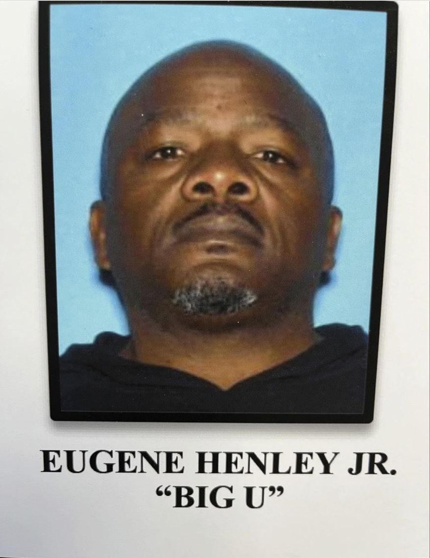 This undated booking photo released by the U.S. Attorney Office of Los Angeles shows Eugene Henley, Jr., a.k.a. "Big U". (U.S. Attorney's Office Los Angeles via AP)